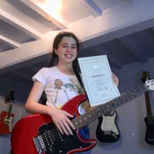 AJ has been awarded grade four distinction in electric guitar by RGT@LCM